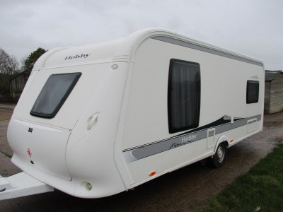 A Hobby 560 UFF caravan with an island bed layout