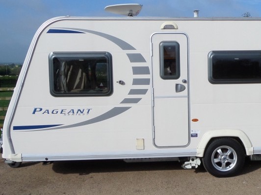The front of a 2009 Bailey Pageant Burgundy caravan